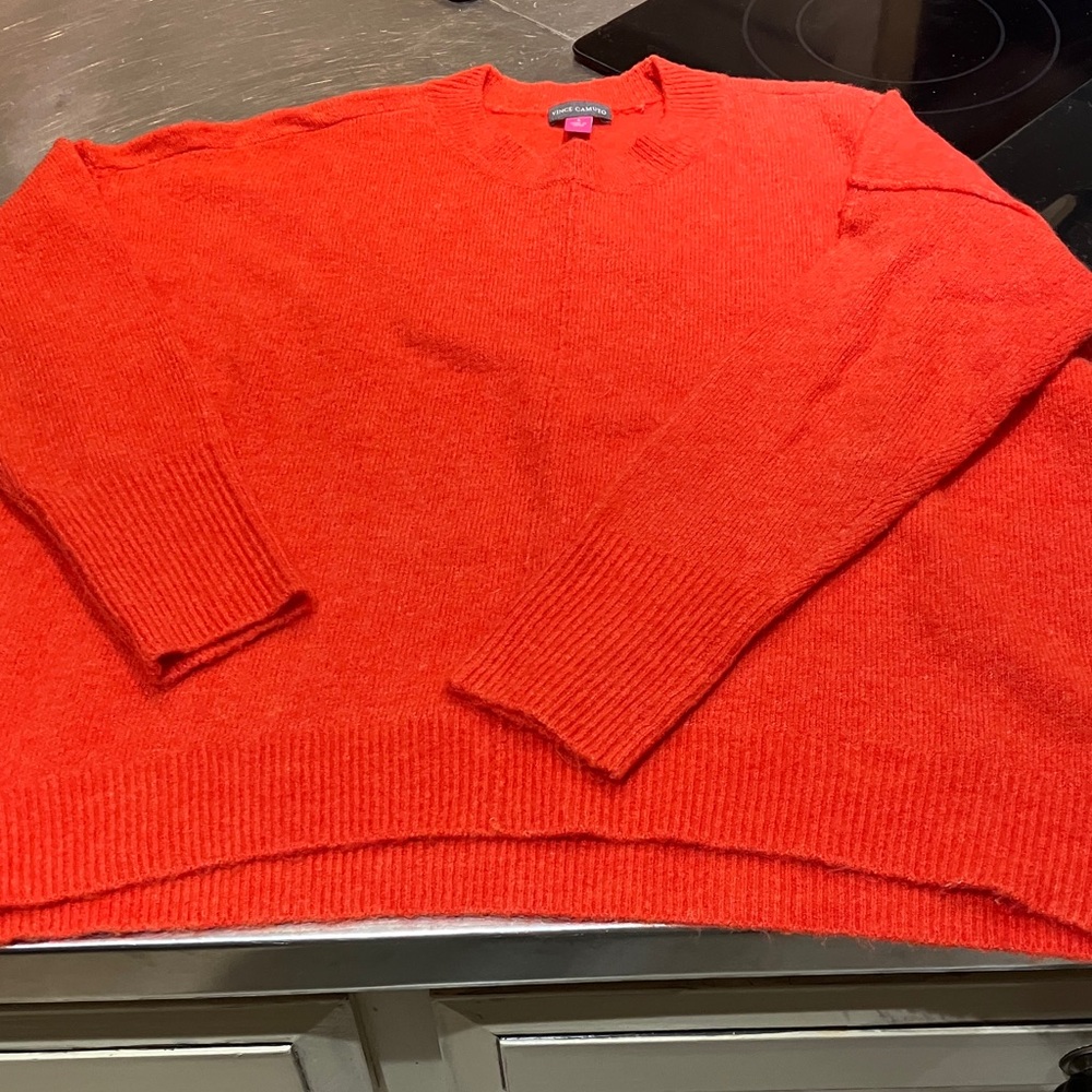 Women’s orange crewneck sweater